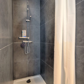 private shower for a sharehome tenant in the abdication house