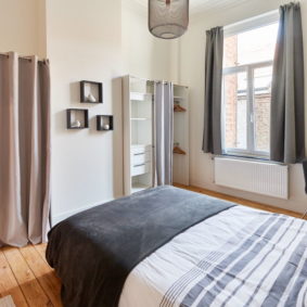 elegant double bedroom in a coliving space in brussels close to different points of interest