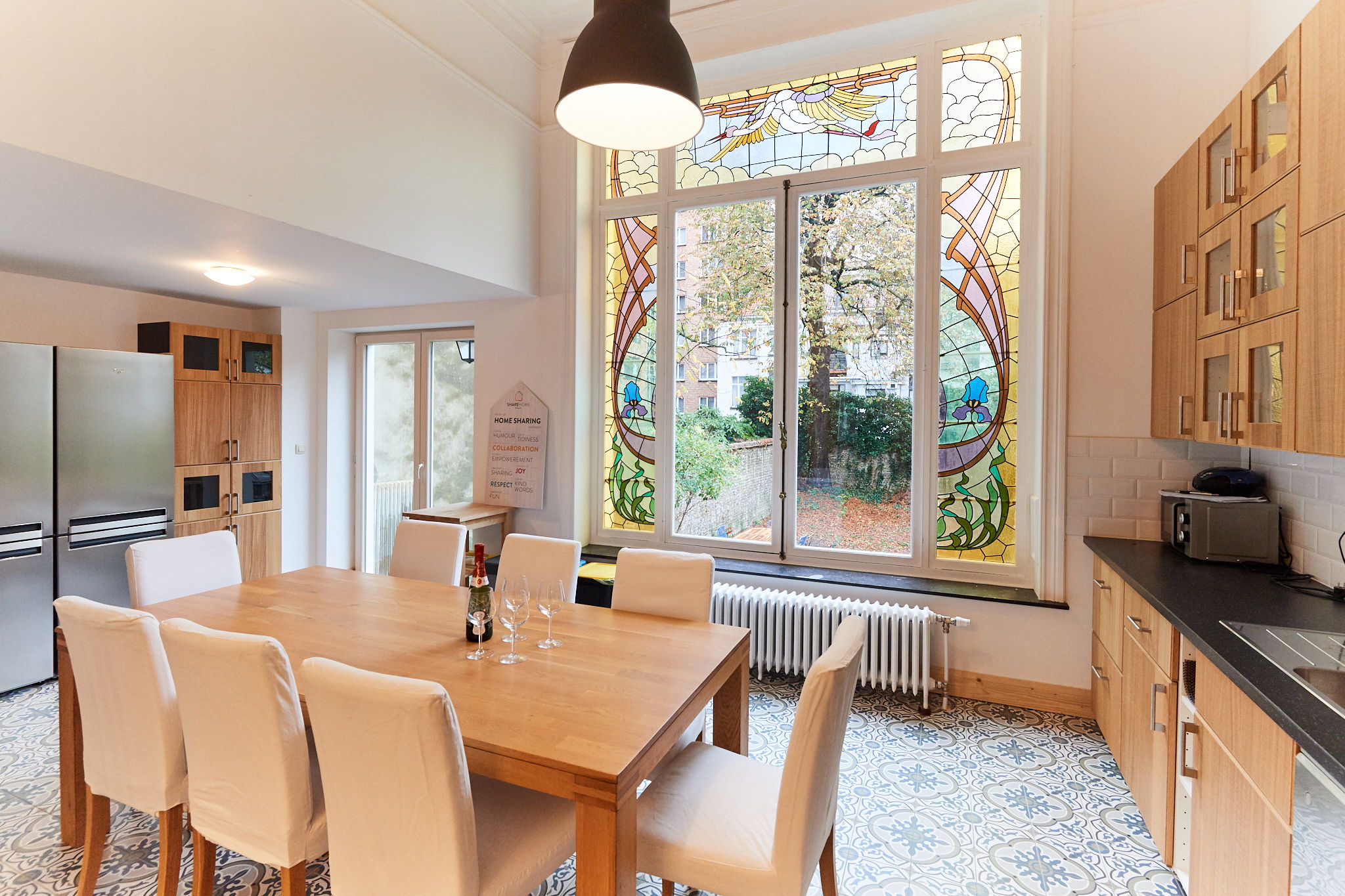 fully-equipped kitchen including oven and microwave and with magnificent original 19th century stained glass windows