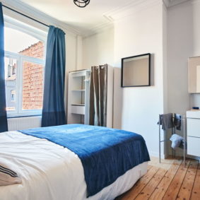 well-decorated comfortable room with private shower and toilet in a shared house in Brussels