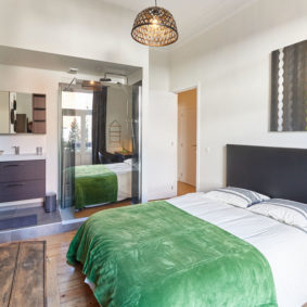 well designed room with quality furniture and a private shower in a house sharing in Brussels
