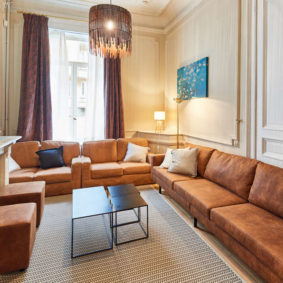 spacious living room in a shared house for 10 international young professionals close to Brussels city center