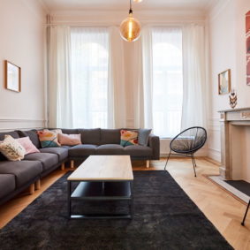 living room designed with taste in a shared house for young internationals in Brussels