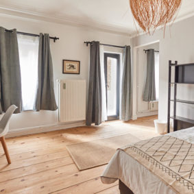 room decorated with taste in a cohousing place for expats in Brussels