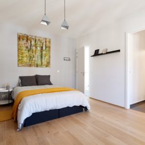 room decorated in a sunny style in a fully refurbished shared home for expats in Brussels