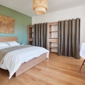 well designed room with quality furniture and a private shower in a house sharing in Brussels