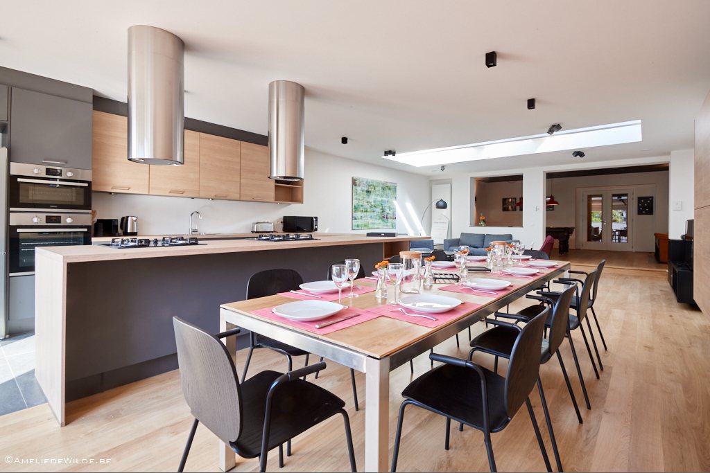 fully equipped kitchen with a design dining table in a shared house for expats in Brussels