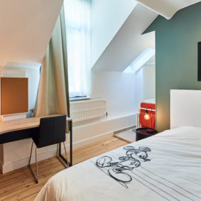 room decorated with taste in a cohousing place for expats in Brussels