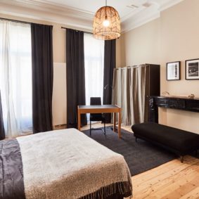 beautifully decorated room with a private shower in a fully refurbished house for expats in Brussels