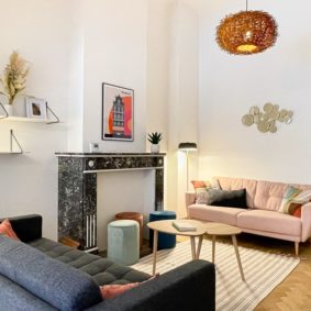 Professionally decorated living room in high-end house to share with community-driven people near EU quarter