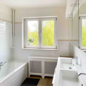 Shared bathroom with double sink and bath tub to share with one other international housemate