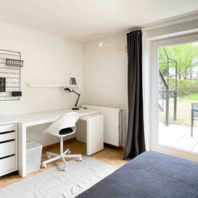 Bright room with high speed internet Wi-Fi, a desk and a chair in a fully furnished shared house in Brussels