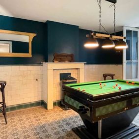 Large decorated basement to enjoy parties and fun game nights with your housemates
