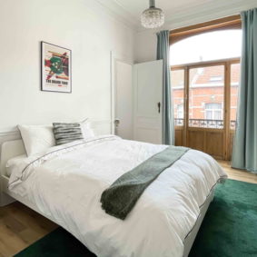 Beautiful and decorated bedroom with big window in a great area of the city