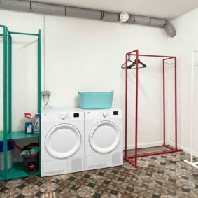 Fully equipped and furnished laundry room in a coliving house of 10 young international workers