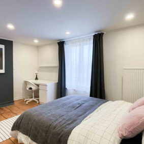 Well decorated bedroom with a large bed in a shared house in Brussels