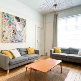 Spacious and well decorated living room in a beautiful coliving in Brussels