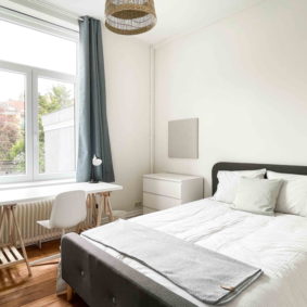 Comfortable bedroom in expat housing close to the subway station