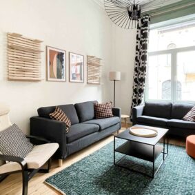 Spacious and welcoming shared living area in Cinquantenaire-located home by ShareHomeBrussels