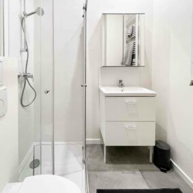 All white bathroom at ShareHomeBrussels cohousing near Josaphat Park