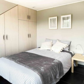 Bedroom with closet at a ShareHomeBrussels coliving residence near Tenreuken Park