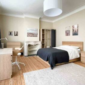 Delightful bedroom of ShareHome cohousing property in the vibrant Plasky neighborhood